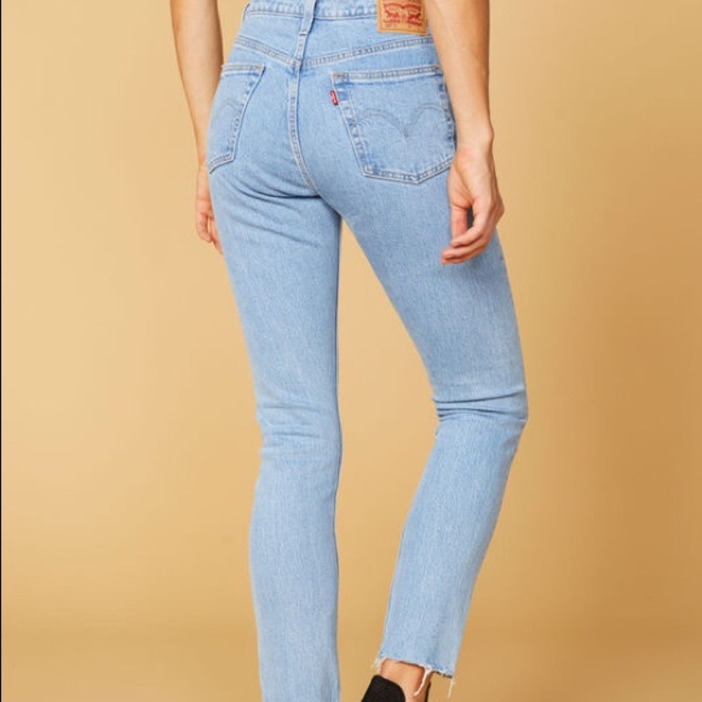 Levis 501 Skinny frayed light wash jeans